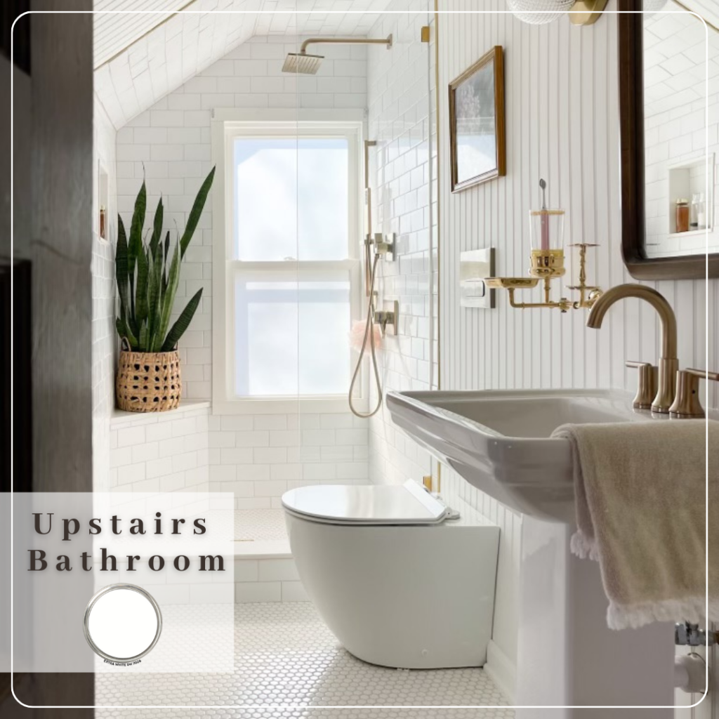 Image of Katie's upstairs bathroom. Everything is in tones of bright white and brass, following the house color scheme.