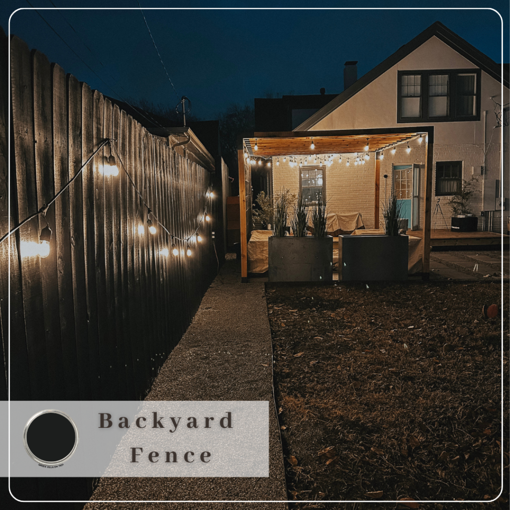 The paint color for Katie's black fence is overlayed on top of a nightime picture of Katie's pergola with the fence in the side.